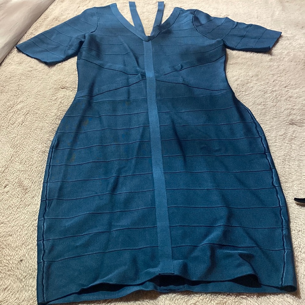Bodycon fit  hugs in all the right places dress blue/greenish!